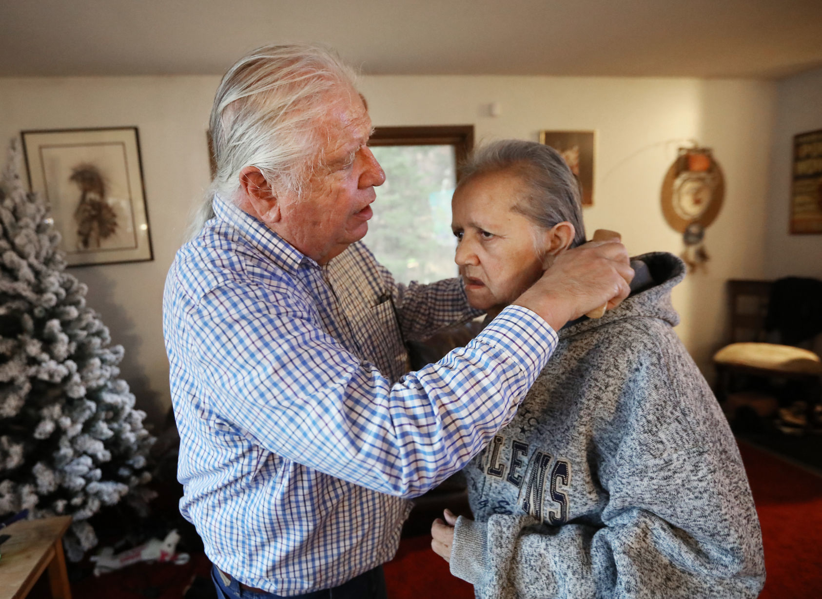 Bill brushing Jacqui's hair
